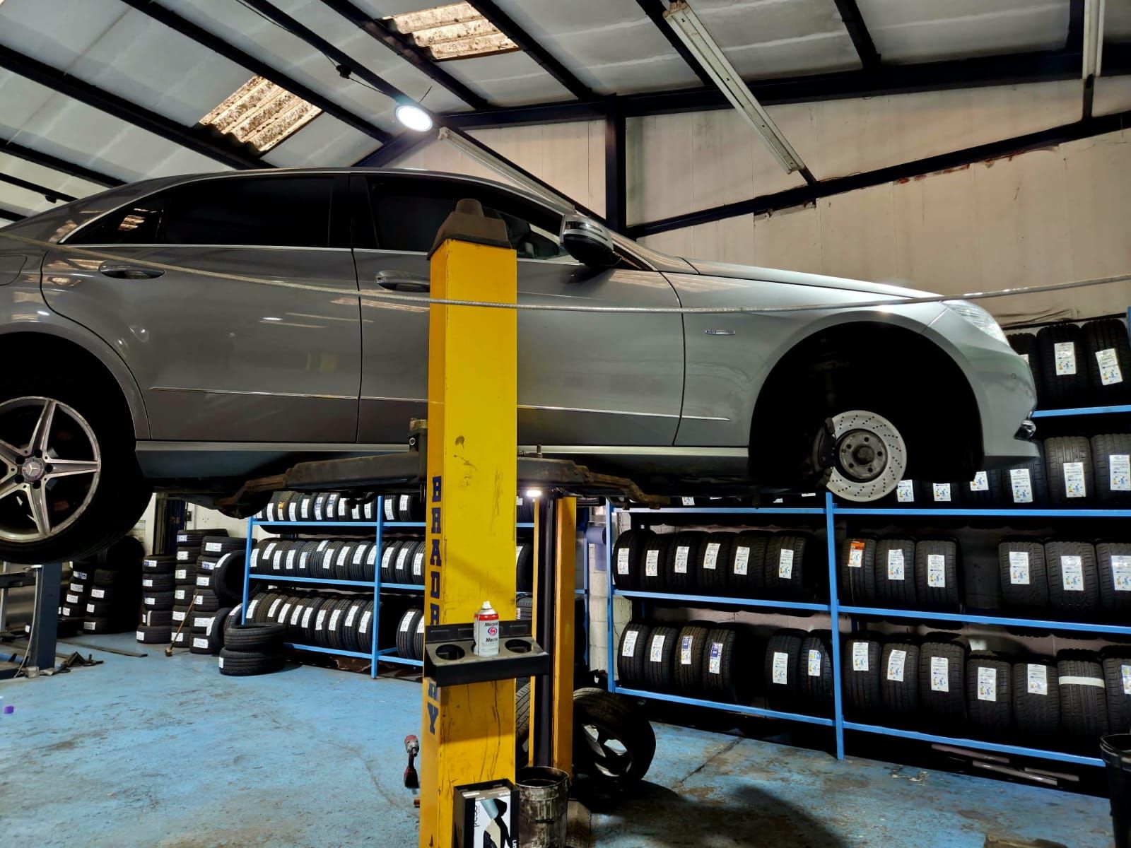 Car in the Worrall Tyres workshop in Bowburn for wheel alignment checks